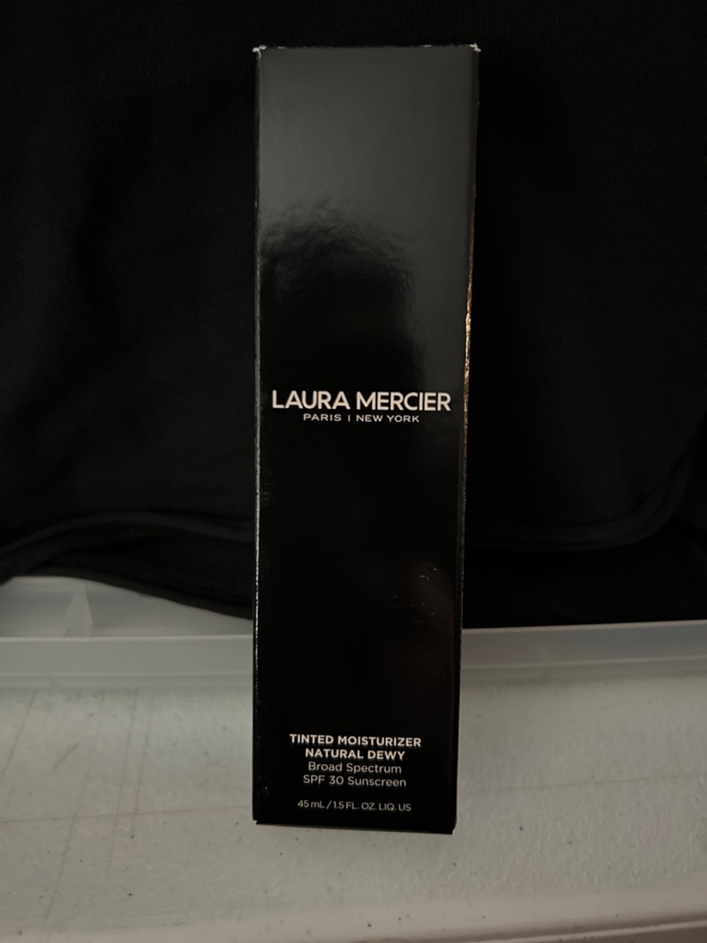 laura mercier Black Packaging Tinted Moisturizer Box